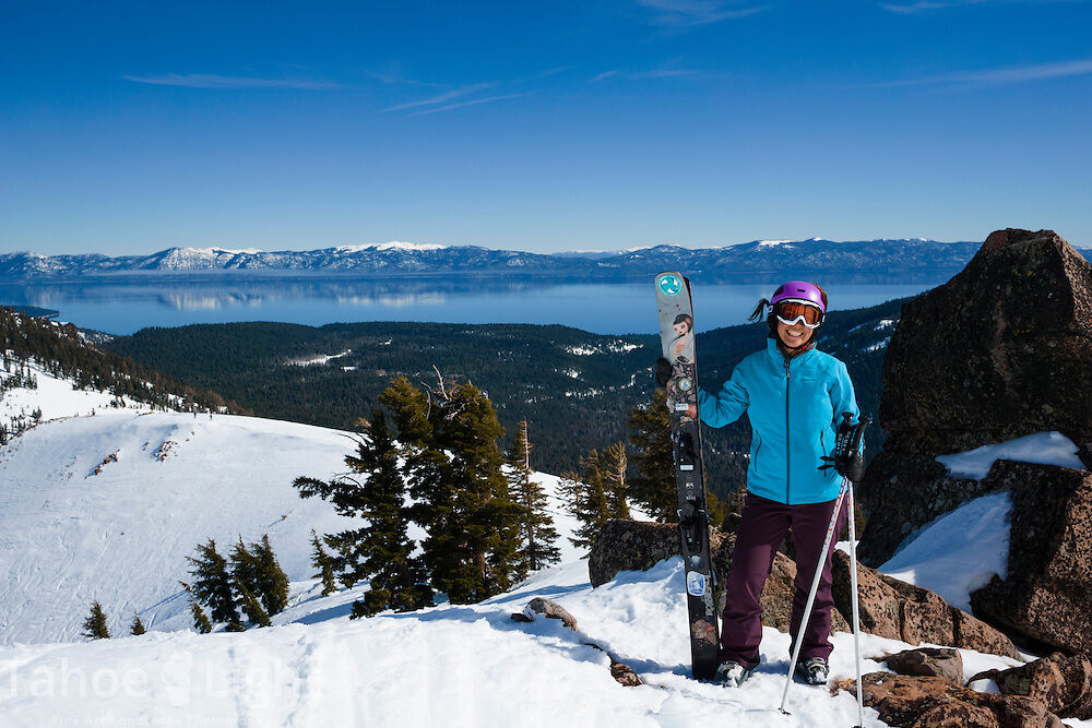 woman on top of ski mountain